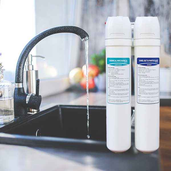 Two-Stage under sink filter with dedicated faucet